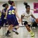 Huron senior Auzhane King drives pass Ypsilanti defenders in the game on Monday, Feb. 25. Daniel Brenner I AnnArbor.com